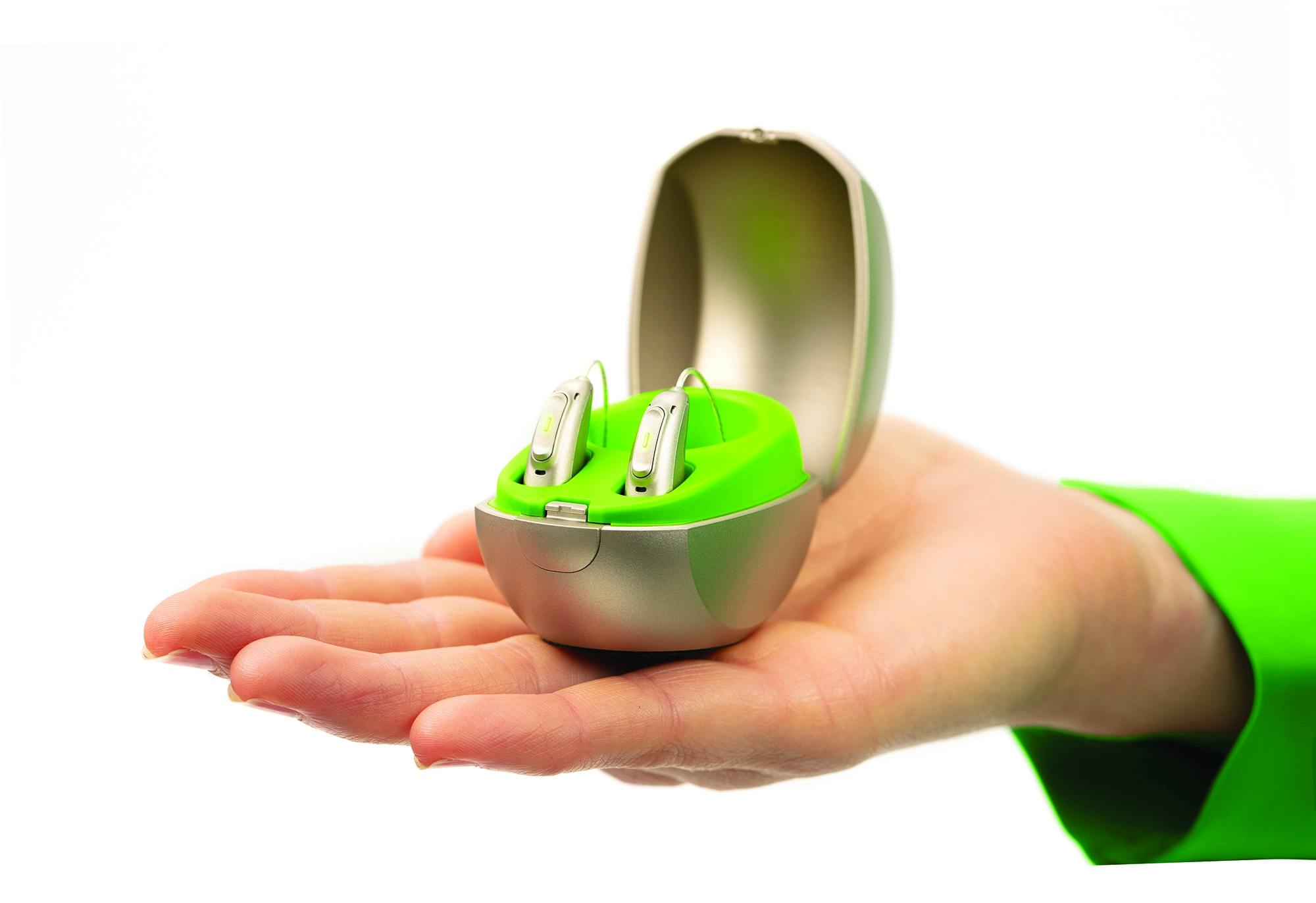 Banner image of hand holding Phonak hearing aids