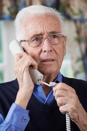 Image of senior man on phone.