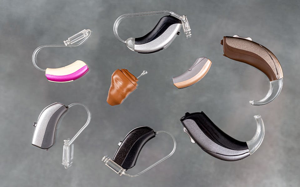 Types of hearing aids styles in different colors